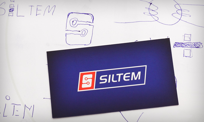 Jeden z pierwszych szkiców oraz ostateczna postać logo firmy SILTEM
